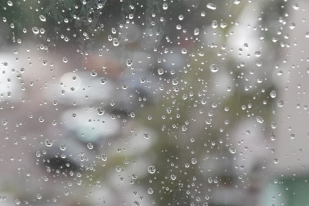 Drops of rain on the window (glass). Shallow DOF.の写真素材