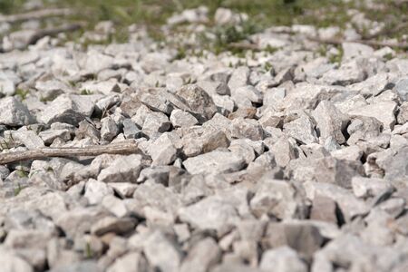 Abstract background from crushed stones, shallow dof