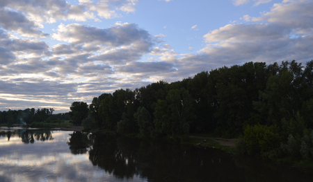beautiful evening landscape with riverの写真素材