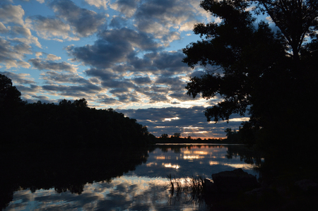 beautiful evening landscape with riverの写真素材