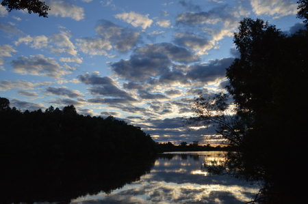 beautiful evening landscape with riverの写真素材