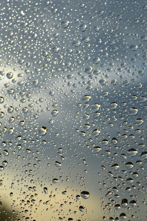 Drops of rain on the window, shallow dof.の写真素材