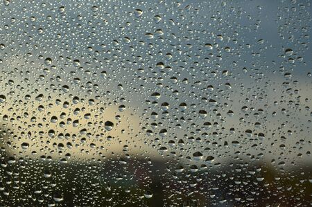 Drops of rain on the glass rainy day.の写真素材