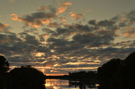 beautiful evening landscape with riverの写真素材