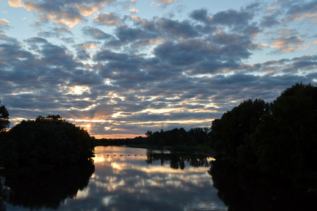 beautiful evening landscape with riverの写真素材