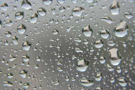 Drops of rain on the window, shallow dofの写真素材