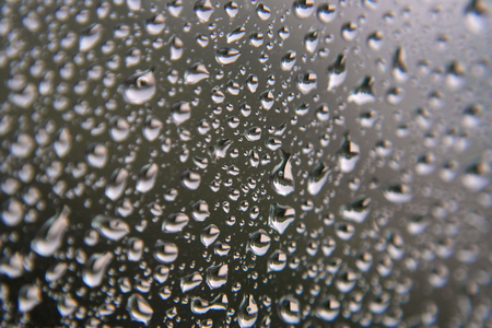 Drops of rain on the window, shallow dofの写真素材