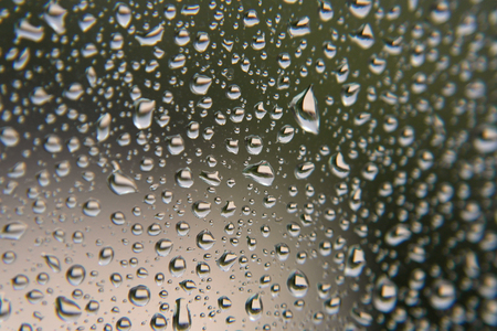 Drops of rain on the window, shallow dofの写真素材
