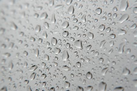 Drops of rain on the window, shallow dofの写真素材