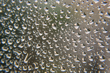 Drops of rain on the window, shallow dofの写真素材