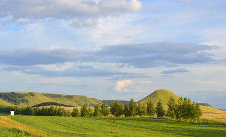 summer landscape with mountain and blue sky with cloudsの写真素材