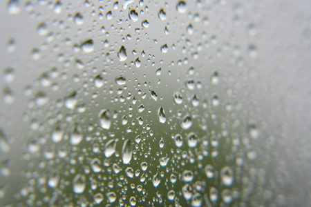 Drops of rain on the window, shallow dofの写真素材