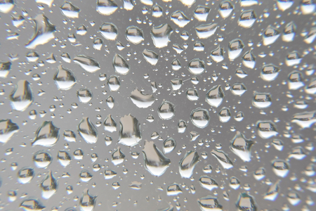 Drops of rain on the window, shallow dofの写真素材