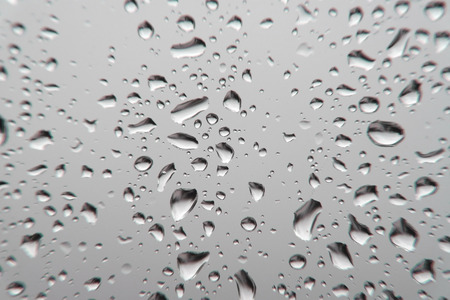 Drops of rain on the window, shallow dofの写真素材