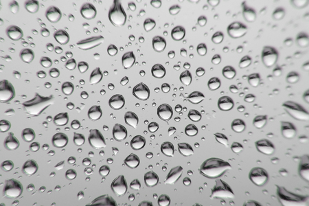 Drops of rain on the window, shallow dofの写真素材