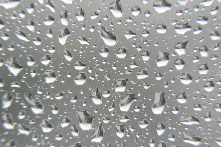 Drops of rain on the window, shallow dofの写真素材