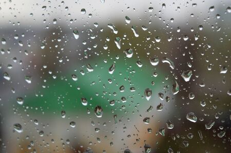Drops of rain on the window, shallow dofの写真素材