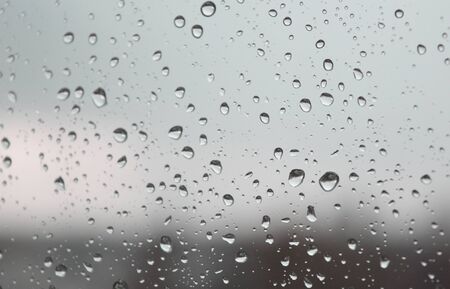 Drops of rain on the window, shallow dofの写真素材