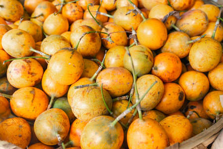 passion fruit in the fruit and vegetable market in asiaの写真素材