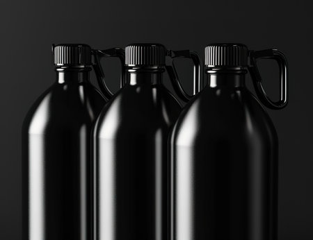 Elegant black stainless steel reusable water bottle isolated on dark background, eco-friendly alternative to plasticの素材