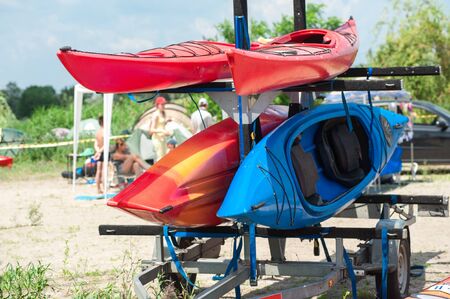 Colorful kayaks on the rackの写真素材