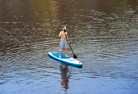 stand up paddle board beach man doing paddle board going paddle boarding