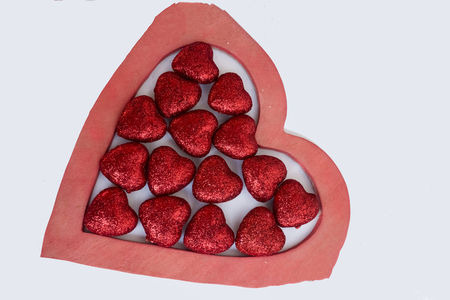 red heart on a white background.の写真素材