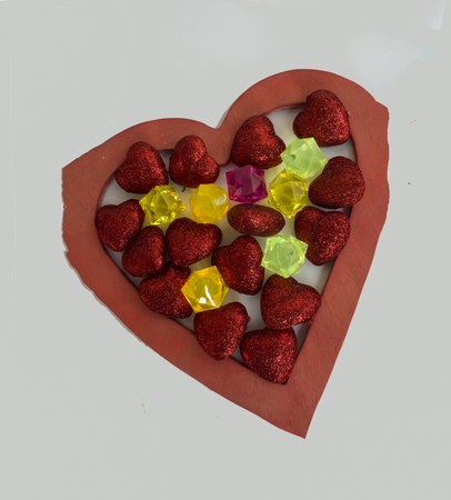 red heart on a white background.の写真素材