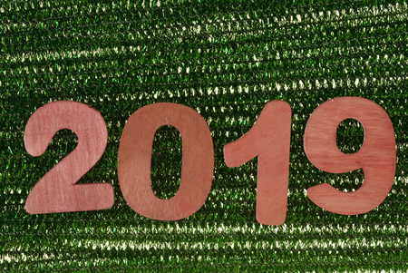Year 2019 of red numbers on the green scenery.の写真素材