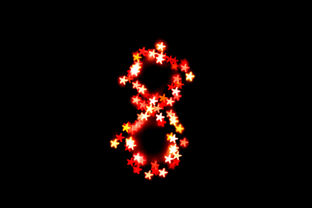 created figure 8 from a colorful bokeh on a black background.International women's day.March 8.の写真素材