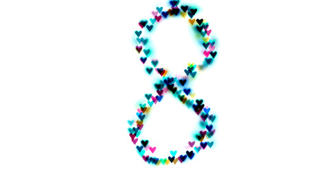 created figure 8 from a colorful bokeh on a white background.International women's day.March 8.の写真素材
