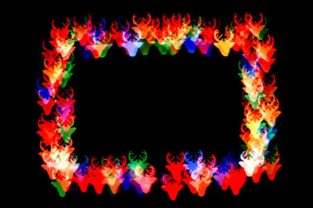 bokeh figure with horns, isolated on a black background figures with horns of different colors form the frame.の写真素材