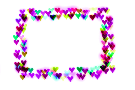 colorful hearts form a frame.bokeh-hearts isolated on white background.photo negative.の写真素材