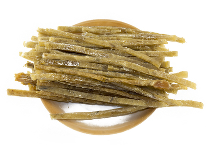 on a white background there are strips of dried Pollock, strips for beer, strips of salted fish.の写真素材