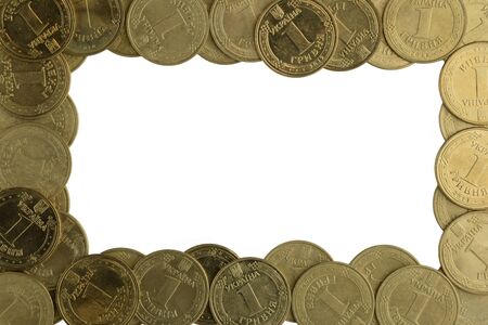 

A lot of photos of iron yellow coins scattered around the edges on a white backgroundの写真素材