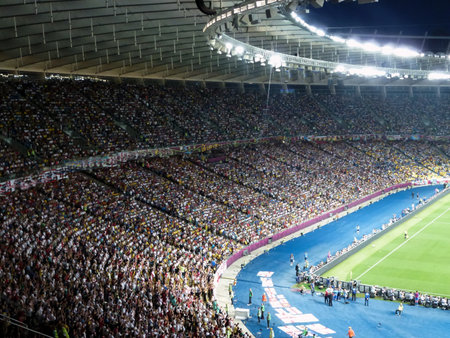 Rows of stands with spectators and fans in a large football stadium. Activity and sportsのeditorial素材