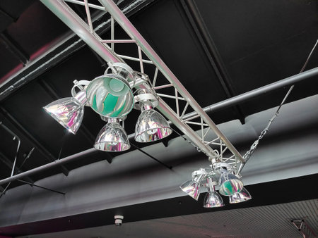 Designer LED lamp on the office ceiling. Interior lighting. Decorative elements on the ceiling.の写真素材
