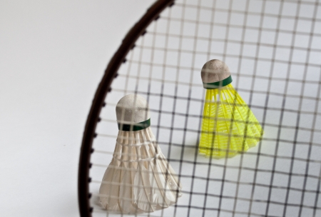 Sports equipment. Badminton racket, shuttlecock on a white background.の写真素材