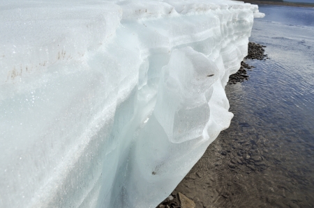 Summer, glaciers, ice. Riverbed Yakut rivers ice does not melt even in summer.