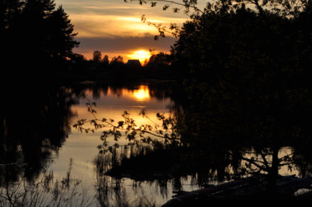 Sunset on a quiet river. May the landscape of the national Park "Meshera", Russia.の写真素材