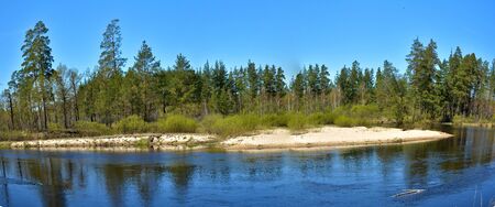Panoramic landscape forest river in spring season in the national Park of Russia.