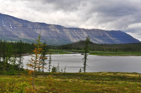 The mountains of lake. The Taimyr Peninsula, Putorana plateau, Siberia, Russia.の写真素材
