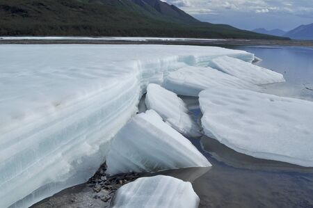 Russia, Yakutia, a ridge of Suntar-khayata, river Suntar, August. The permanent ice fields in the...