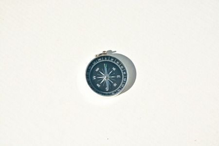 Magnetic compass. Compass - navigation instrument, on a white background.