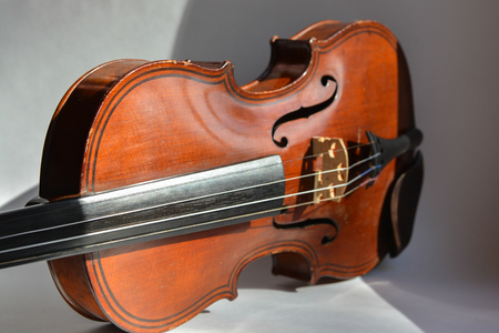 Old German violin. A stringed musical instrument originally from Saxony of the early 19th century.の写真素材