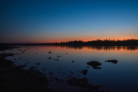 Sunset on the North river. Evening sky colors.の写真素材