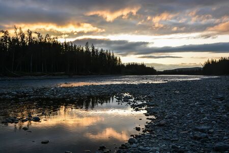 Sunset on the North river. Evening sky colors.