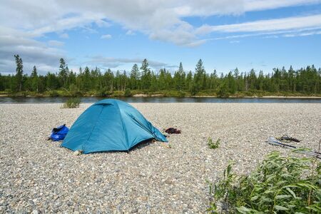 Tourist tent. Camp travelers in the wild.の写真素材
