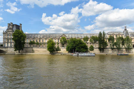 Summer Paris, embankment of the Seine. Cityscape of the capital of France.