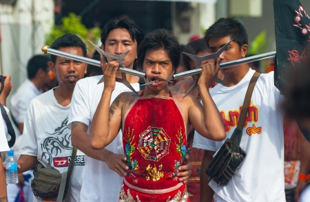 PHUKET, THAILAND- OCT 23: Unidentified participant the parade on October 23, 2012 Vegetarian Festival Phuket Thailand. The Festival is a famous annual festival also known as Nine Emperor Gods festivalのeditorial素材